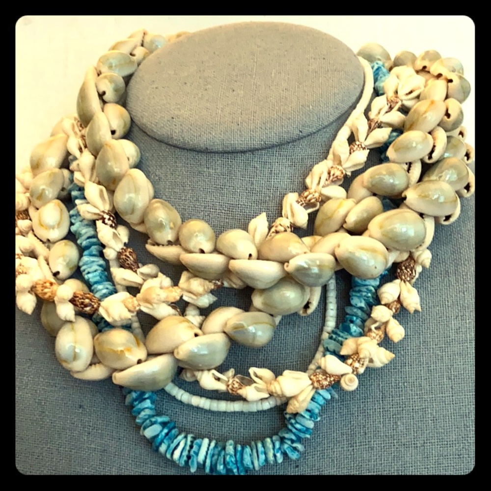 Four gorgeous vintage shelled necklaces